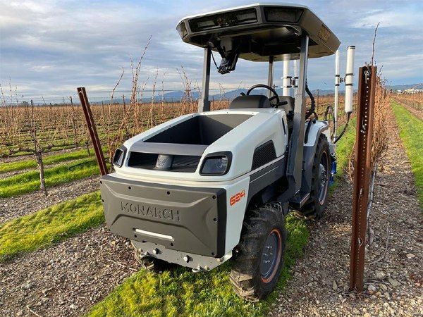 Driverless tractor in a vineyard.