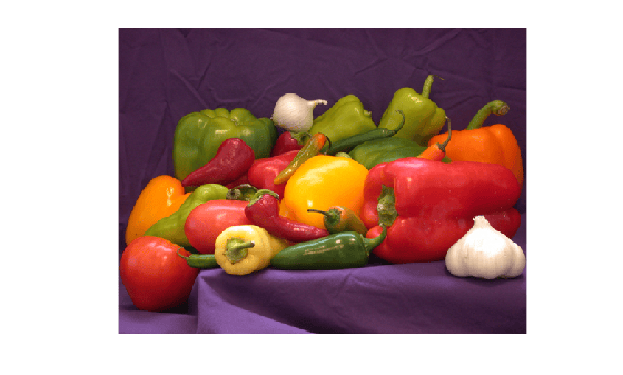 Photograph of vegetables including red, yellow, and green peppers and garlic
